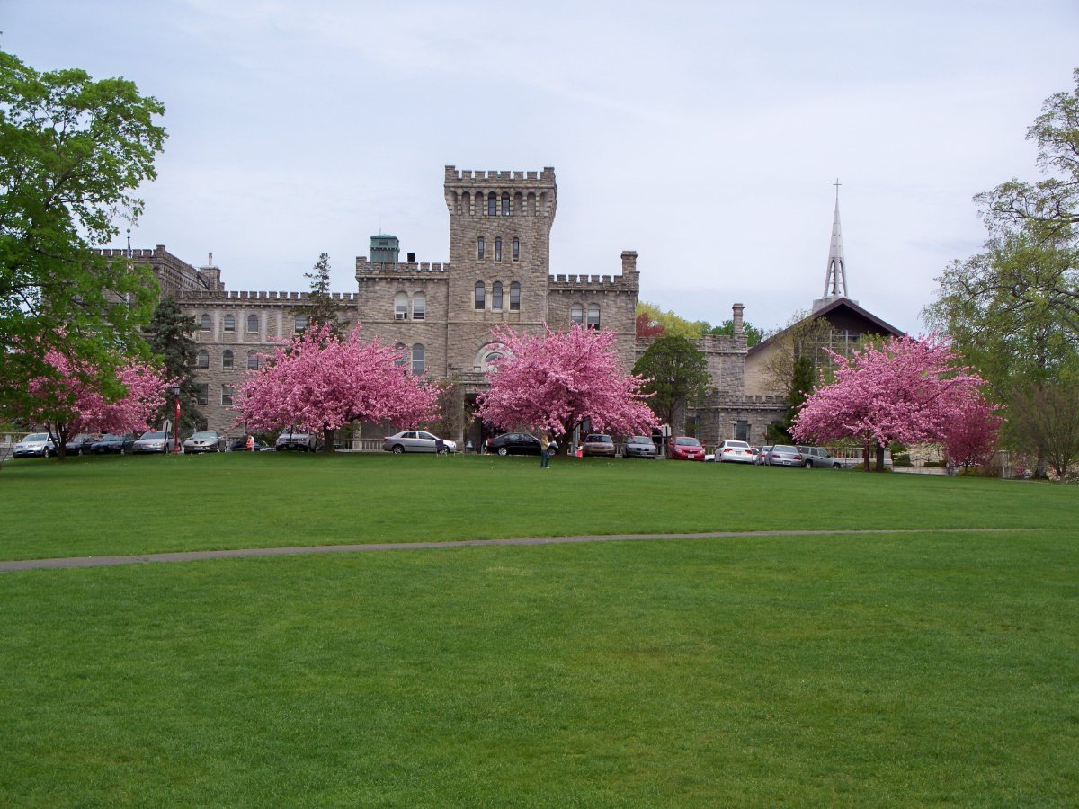 Manhattanville castle with spring cherry blossoms in Purchase, Harrison NY