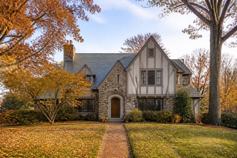 A Tudor-style home on a tree-lined street in autumn, Home Selling Timeline in Scarsdale, NY