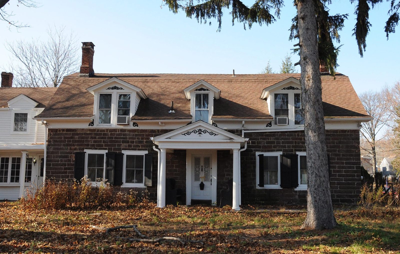 Historic home on a tree-lined street in Teaneck, NJ
